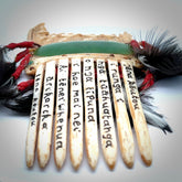 A photo of a New Zealand Jade Traditional Maori Heru, comb. This is a one off, statement piece - hand crafted here in New Zealand by Jeremy. Unique Art to Wear. Gifts for all lovers of hand made Art to Wear. One only collectors pendant. Delivery is free worldwide.